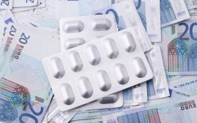 Picture of pills on money